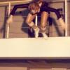 Lisa jumping from a balcony